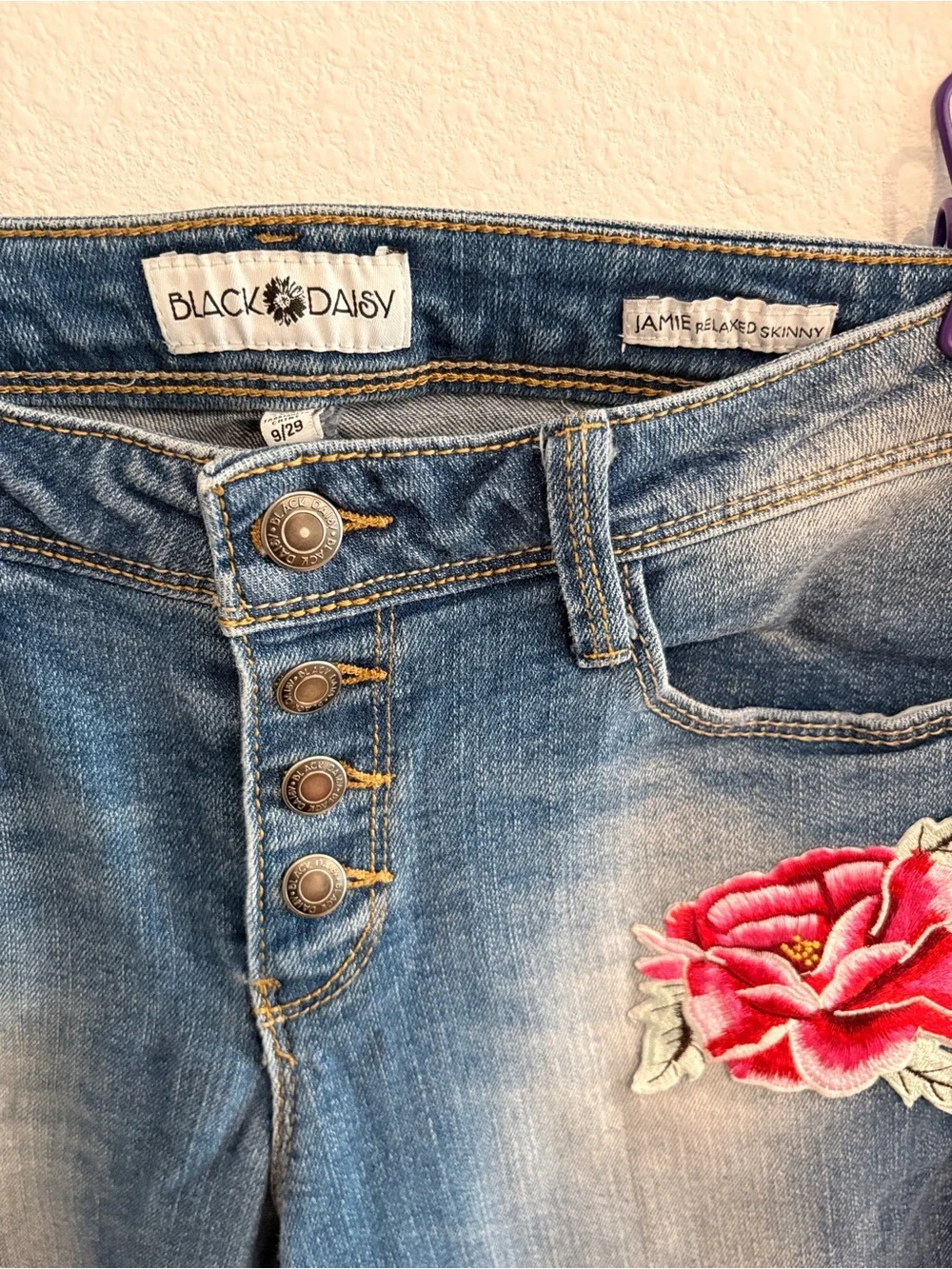 Women’s Black Daisy Blue Distressed Jeans with Red Rose Embroidered Patches - Picture 3 of 6